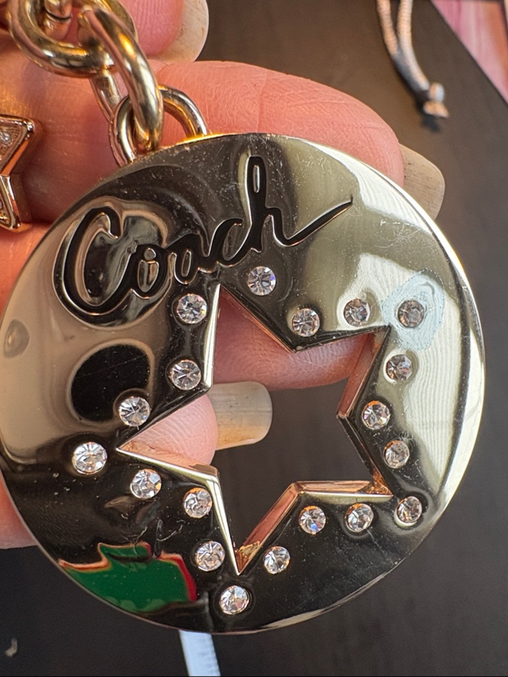 Coach Gold-Tone Star Cutout Keychain with Crystal Accents - Picture 5 of 5